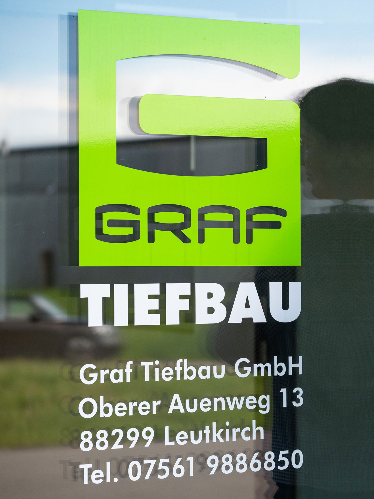 Graf Tiefbau Logo mit Adresse